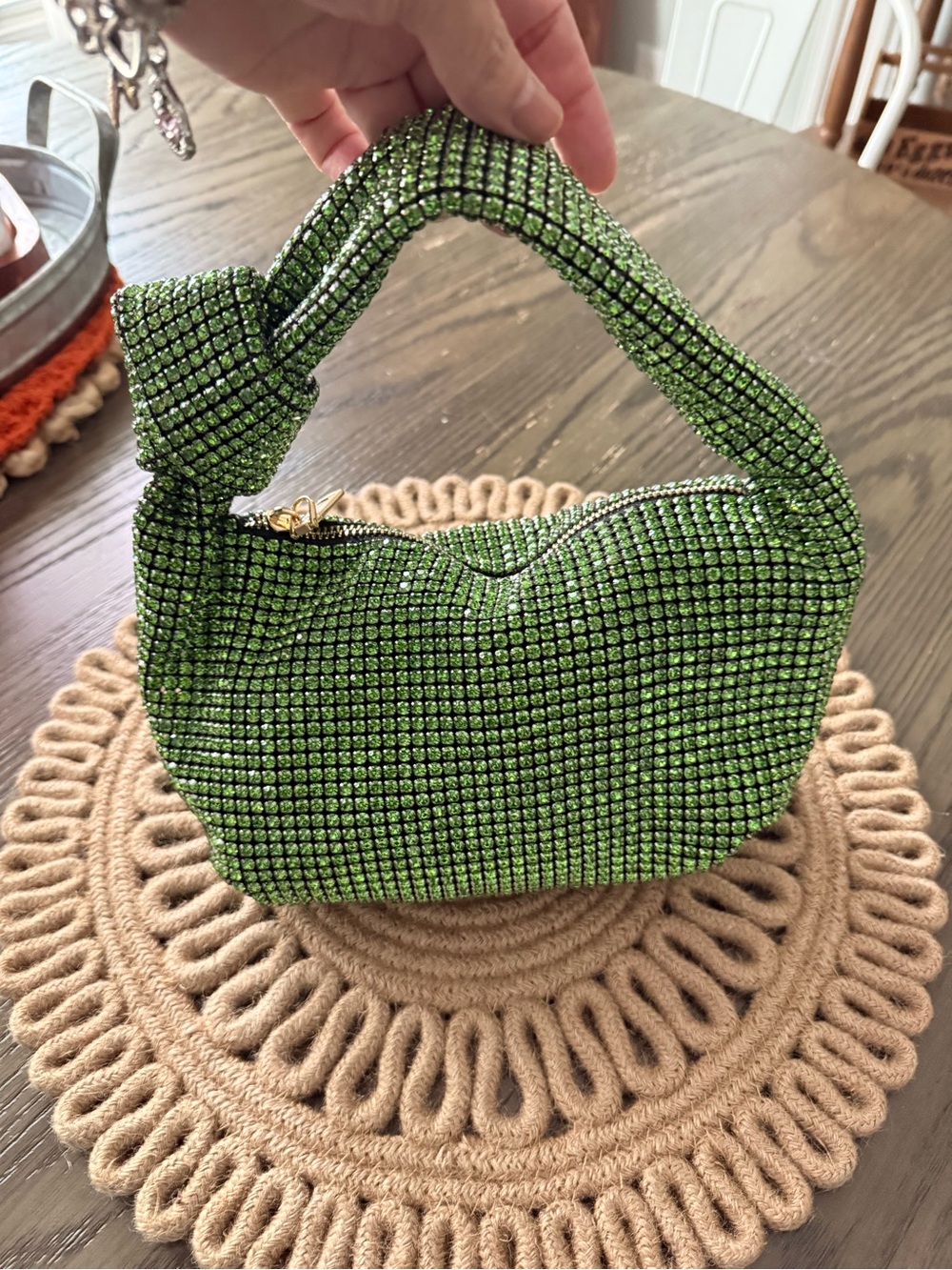Madison West Sparkling Green Rhinestone Knot Purse.